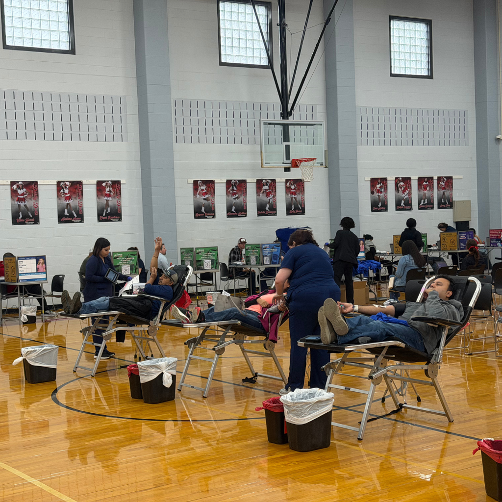 gym full of people donating blood
