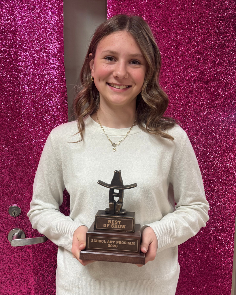 tupa with trophey from rodeo art contest