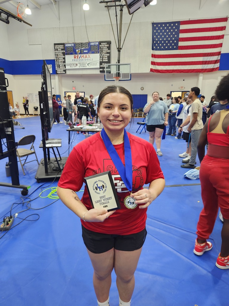 bethany with medal and plaque