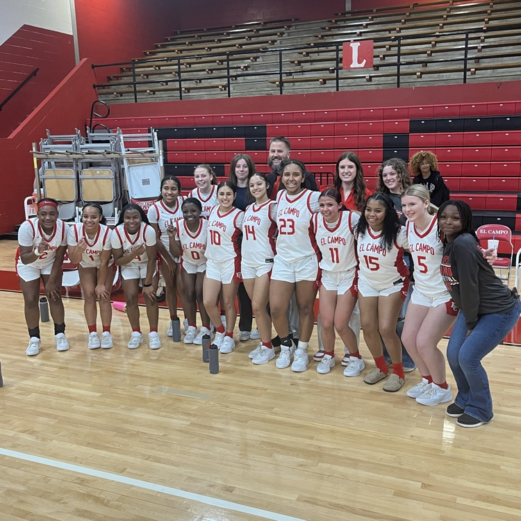 team huddled together to celebrate the championship 