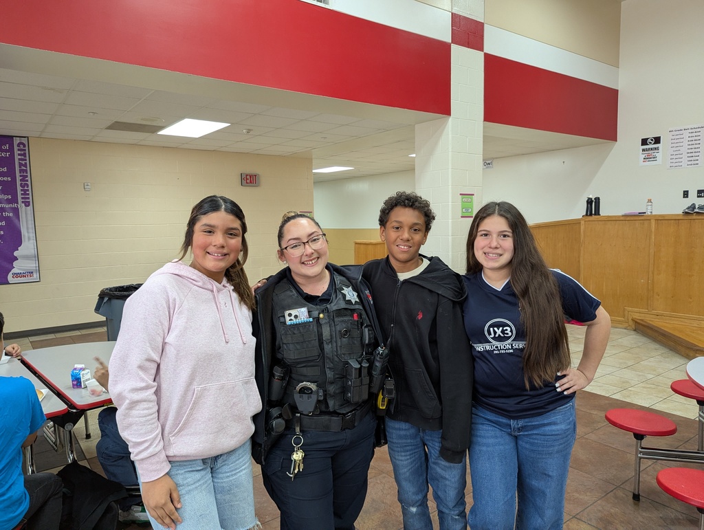 rivera with middle school students