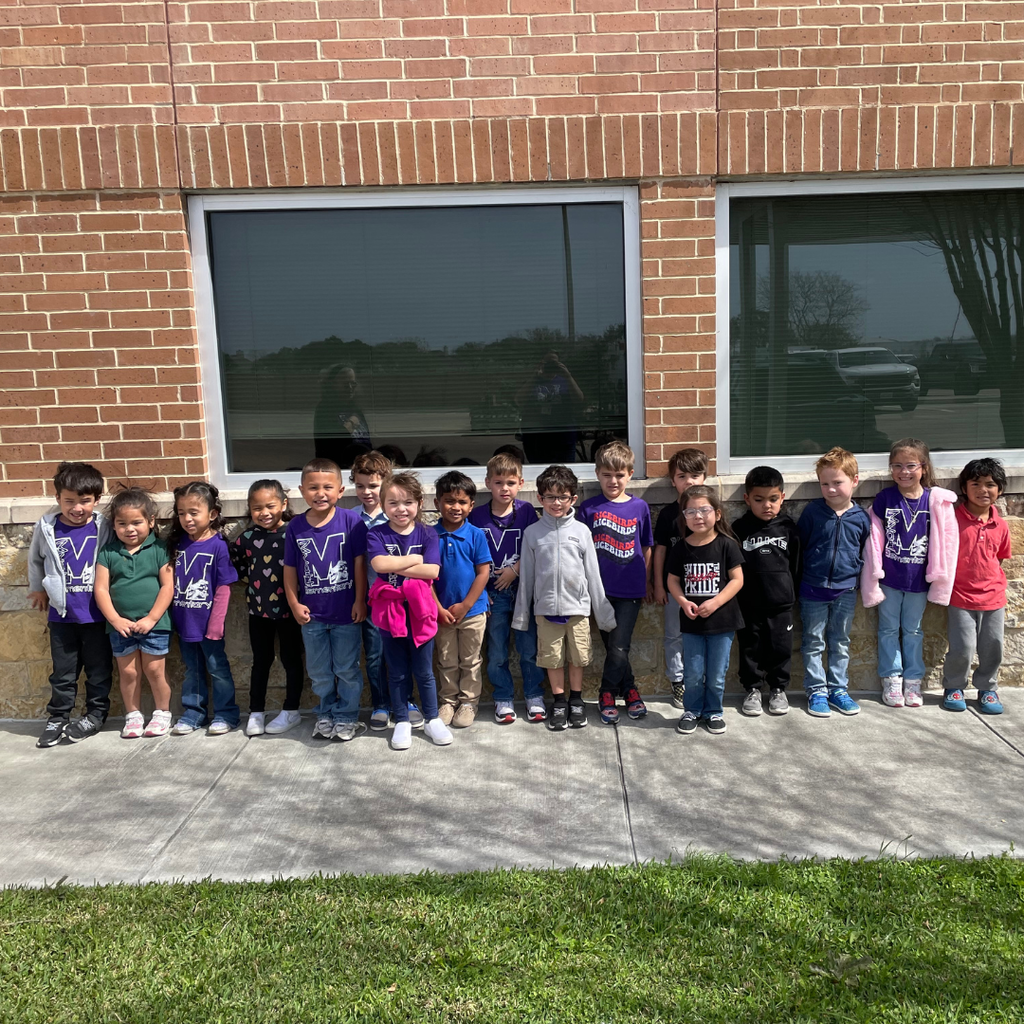 class picture in front of the police department