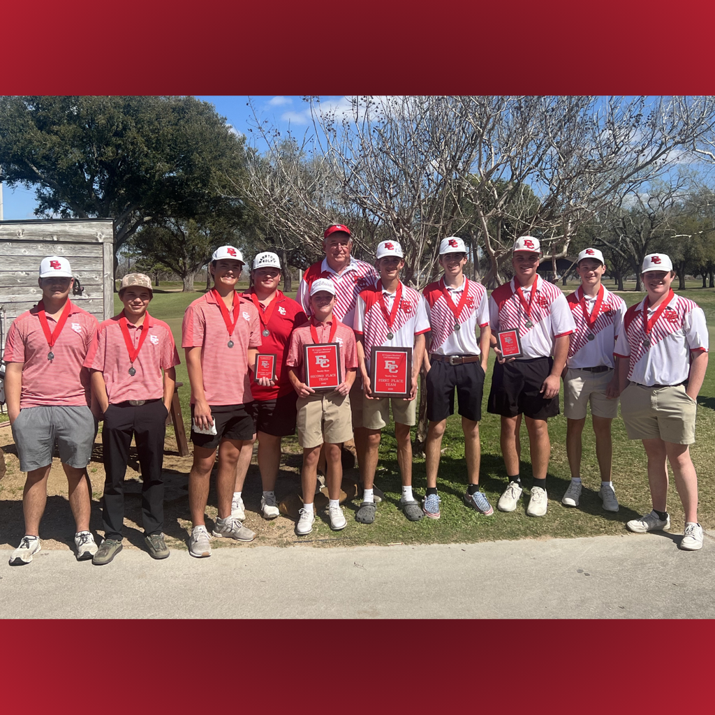 golf boys wearing their medals with 4 boys holding plaques
