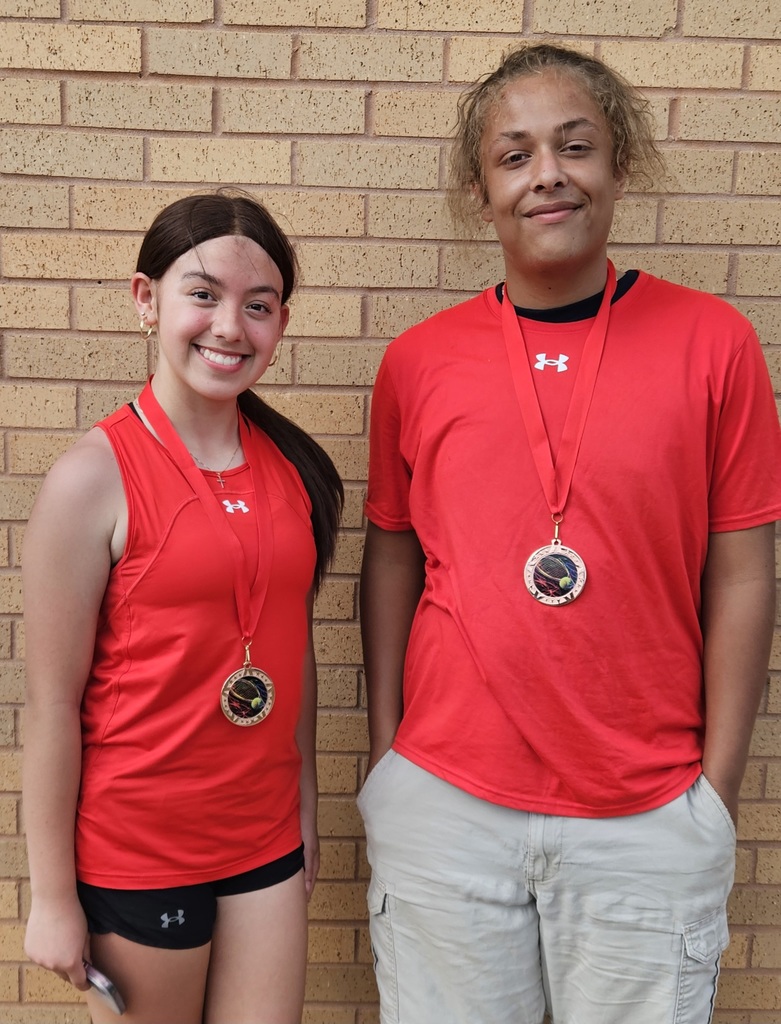 Kylie Flores & Noah Santiago with medals