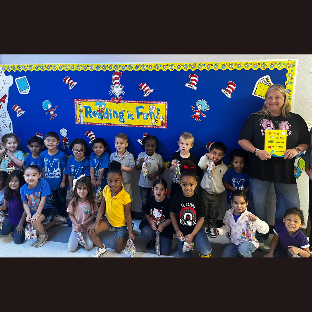 students in Janik's class posing with ms. janik