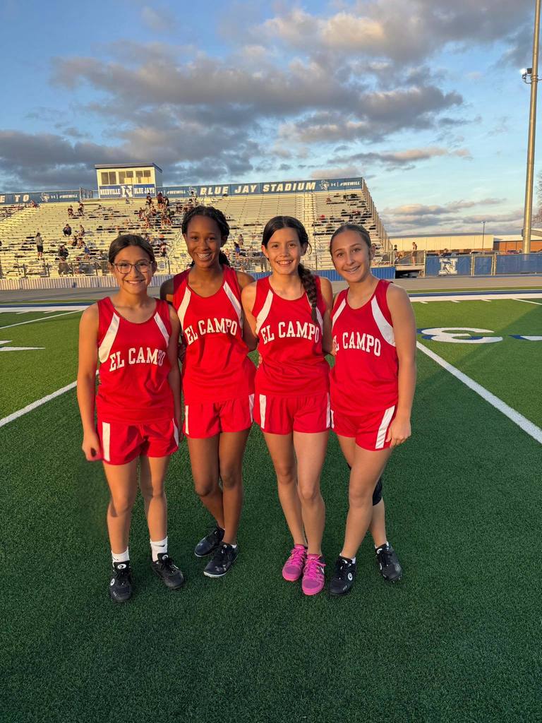 4 girls in red el campo track uniforms