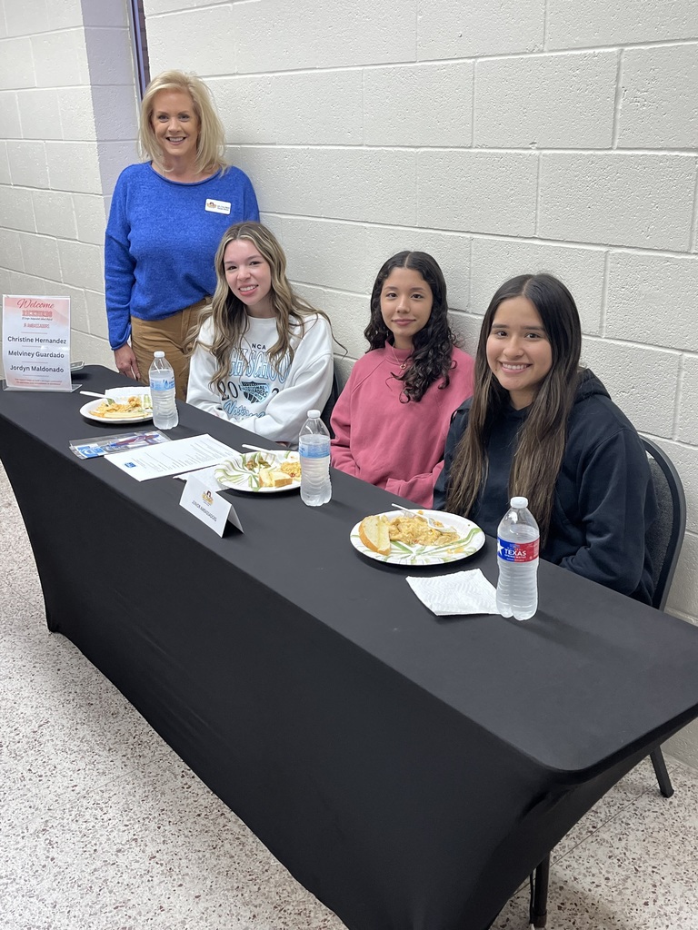 Kelly with 3 girls from the high school