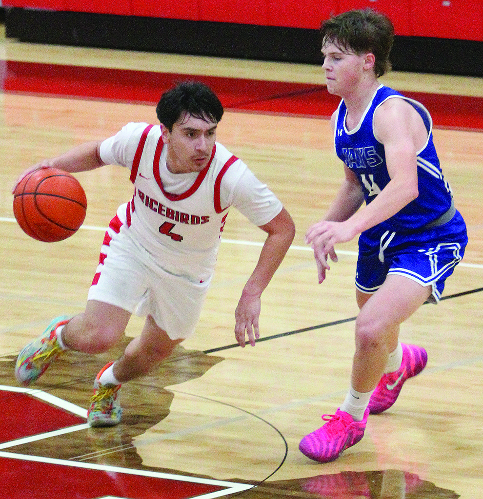 Andrew dribbles past opponent