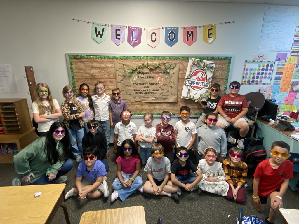 group of kids wearing sunglasses in the classroom
