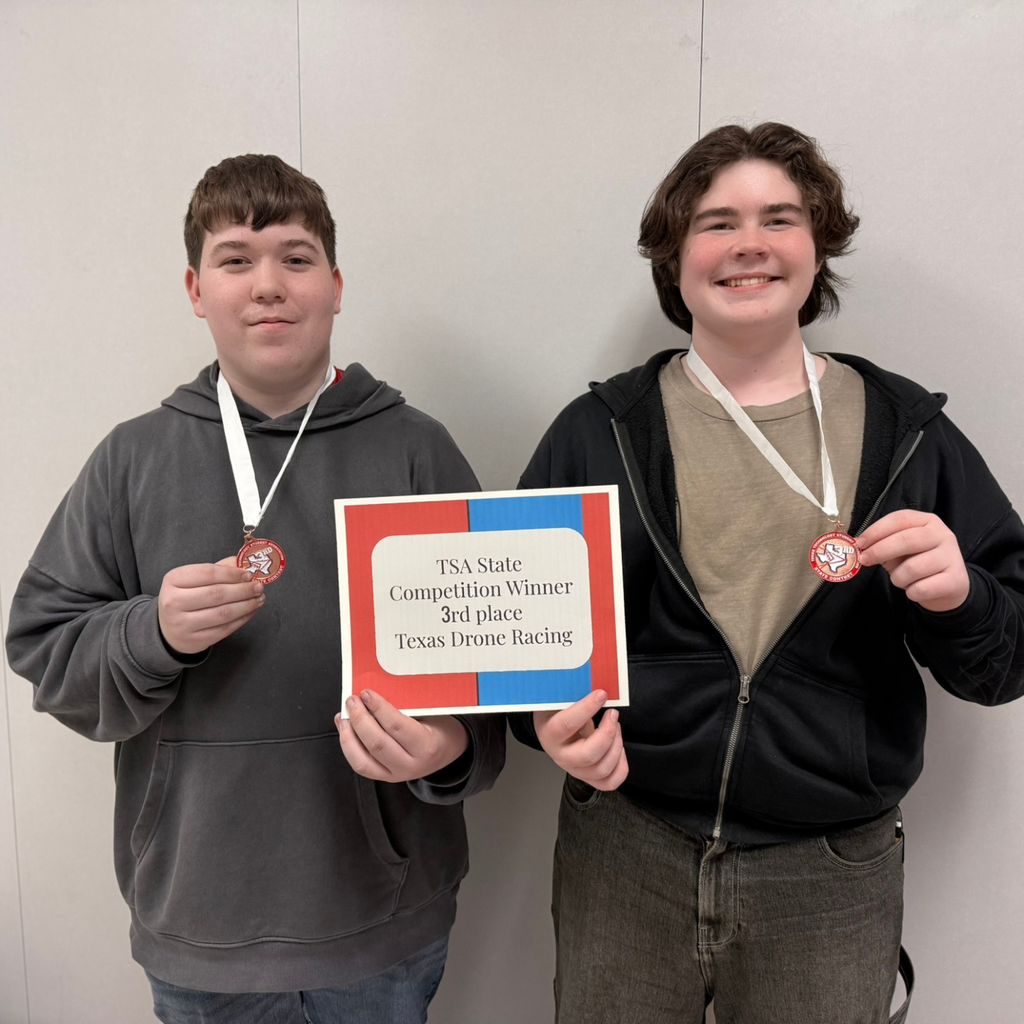 Clapp & Chisum wearing their 3rd place medals