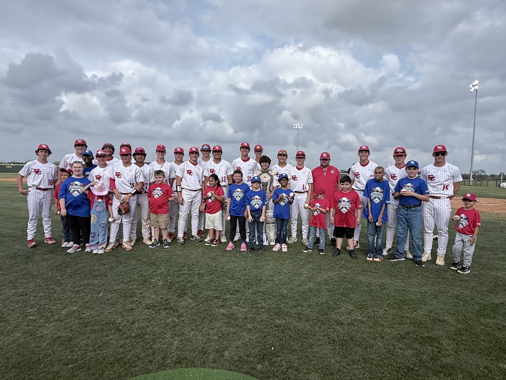 baseball players standing with challenger league kids