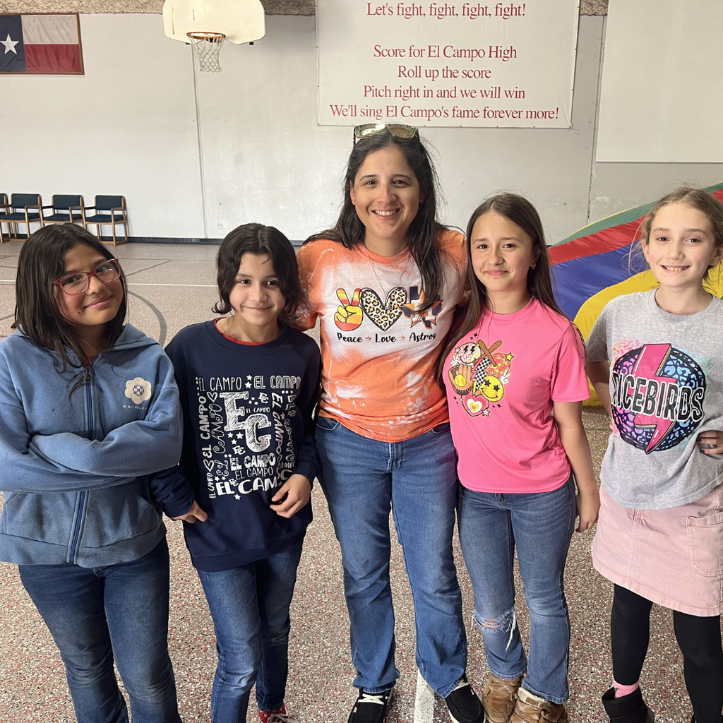 1 adult surround by 4 happy girls