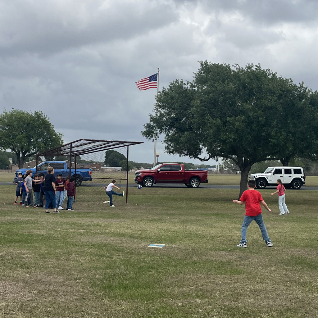 kids playing kickball out side