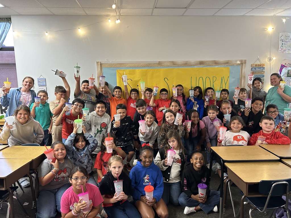 Ms. Stock and Mrs. Merta’s classes posing with their drinks