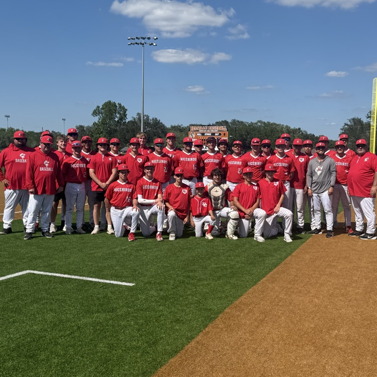 ricebird, baseball team and coaches on the field after the game