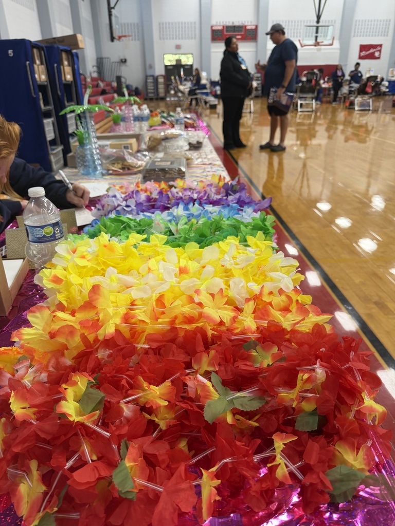 table full of leis