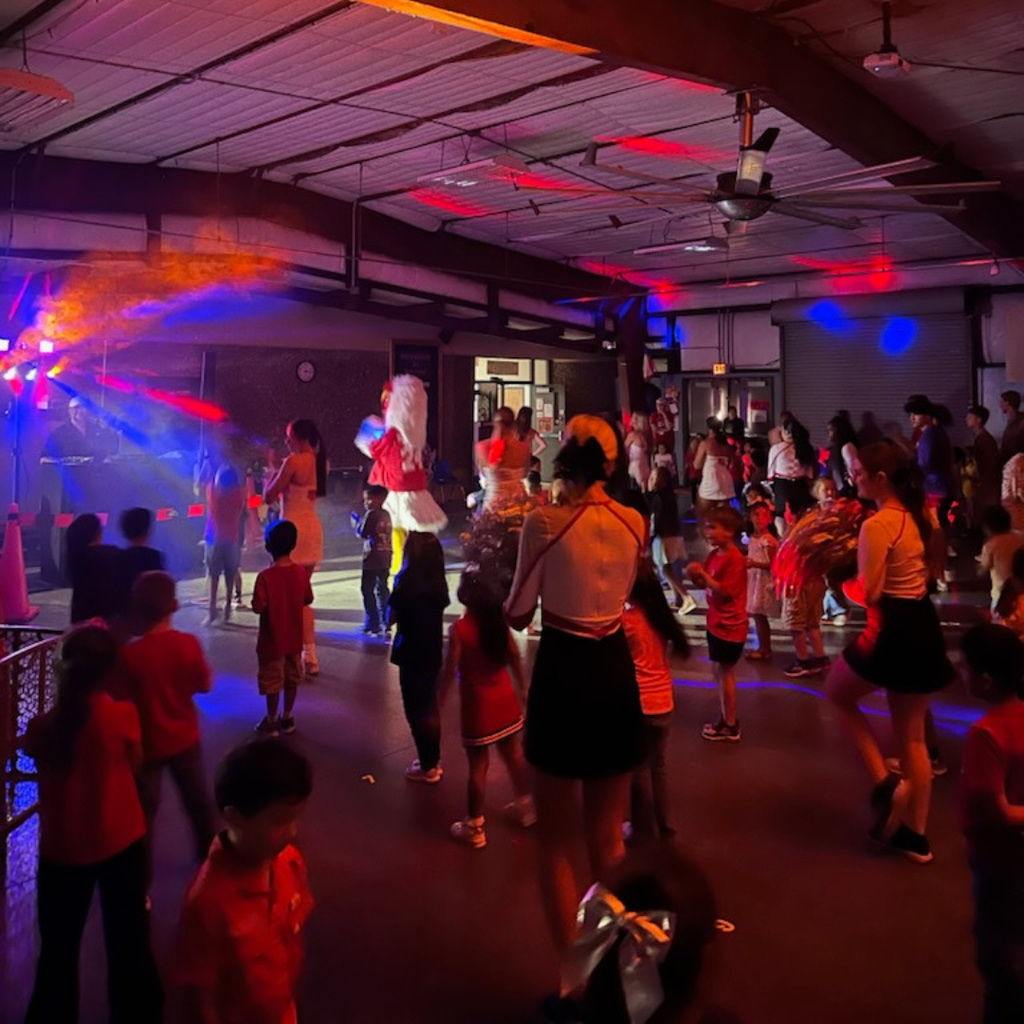 ricky leading the dancing in neon lights