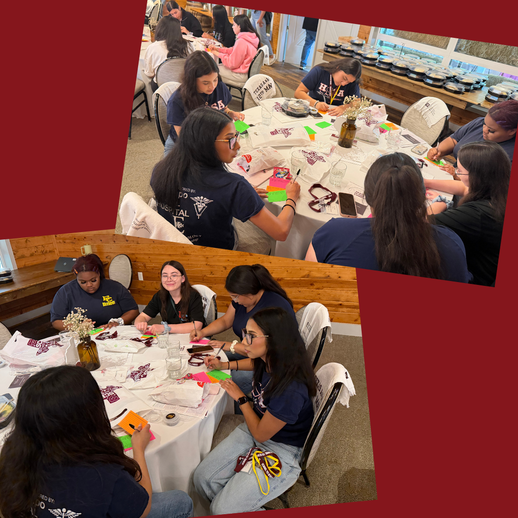 students at round tables working on a hands on activity
