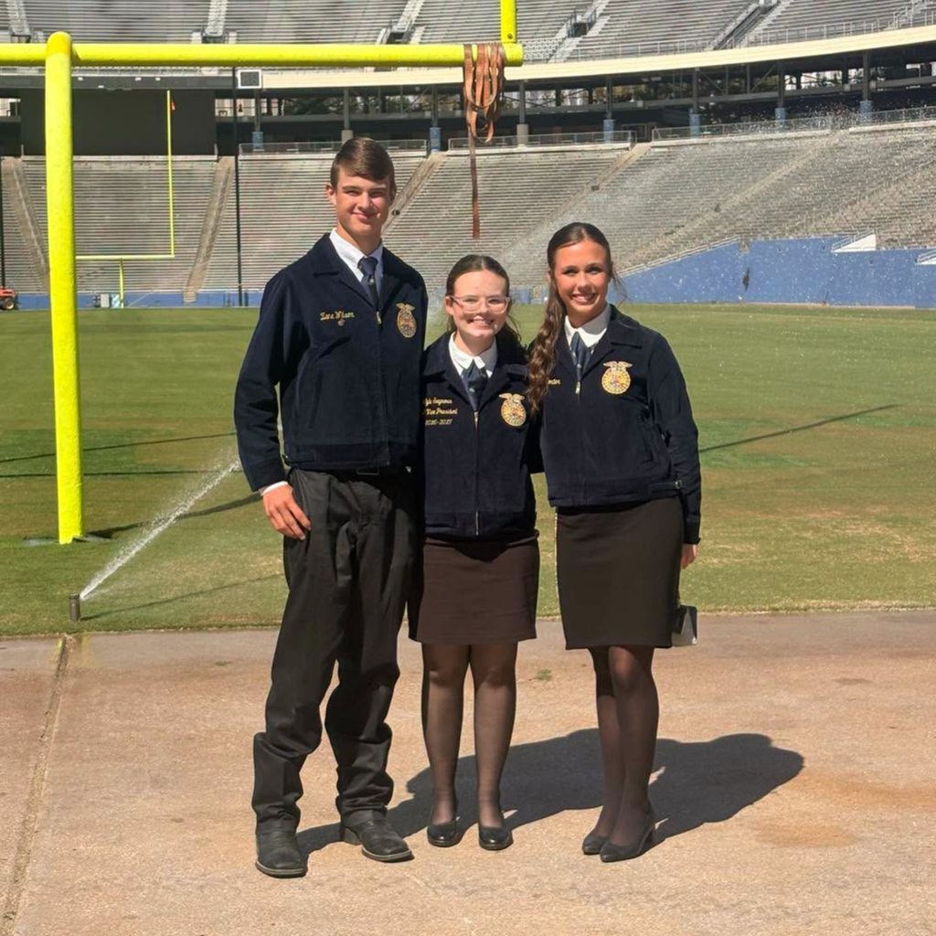 Zane, Lyla, and Abigail in the cotton bowl stadium