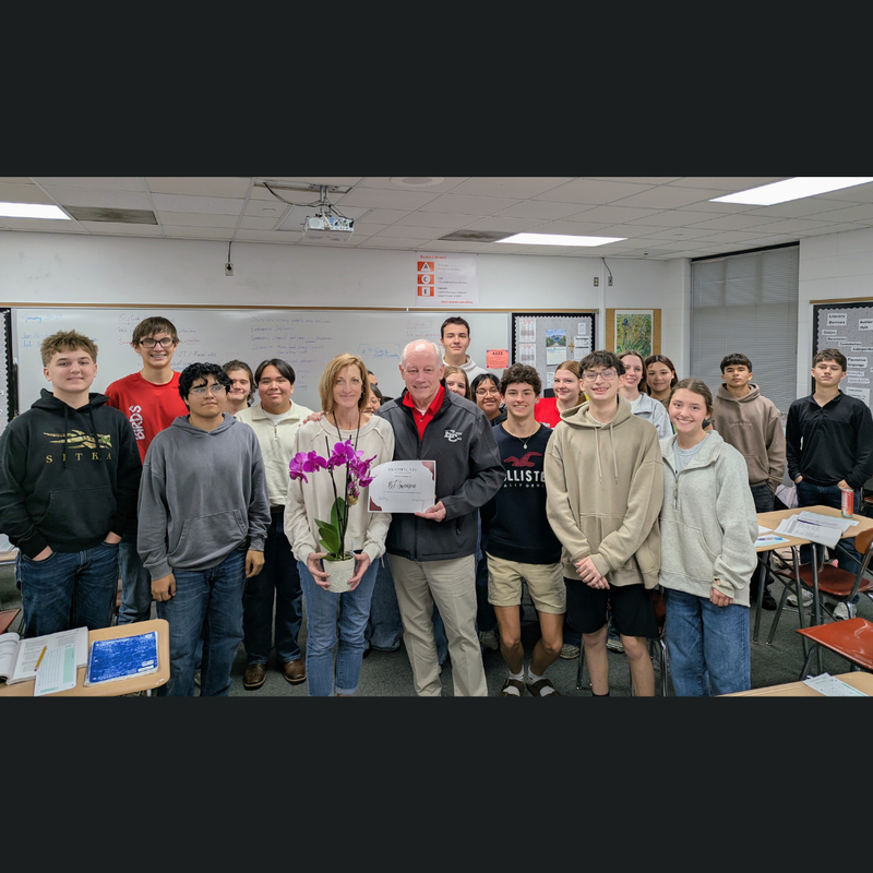 swenson with students and superintendent
