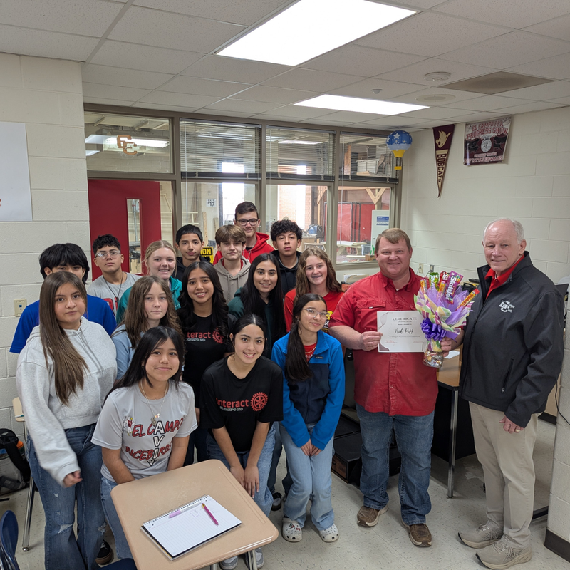 popp with students and superintendent