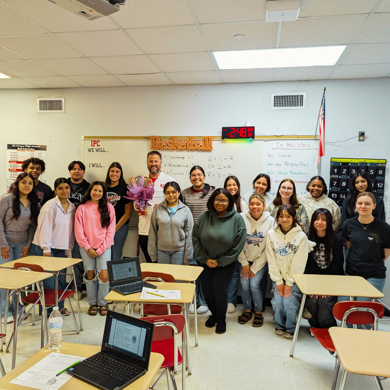 brock surrounded by high school students