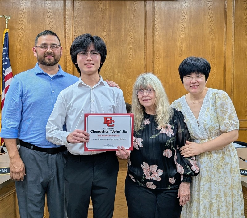 John with mom, piano teacher, and band director