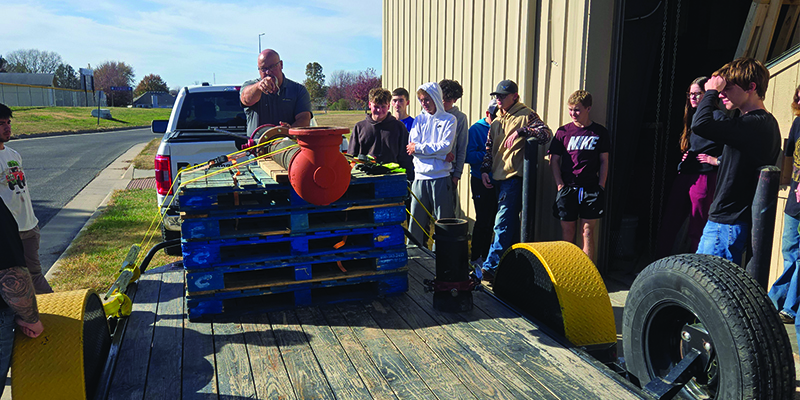 students learning how to install a fire hydrant