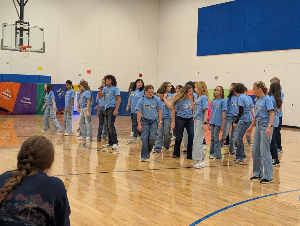EMS students previewing songs from the musical for Skelly students