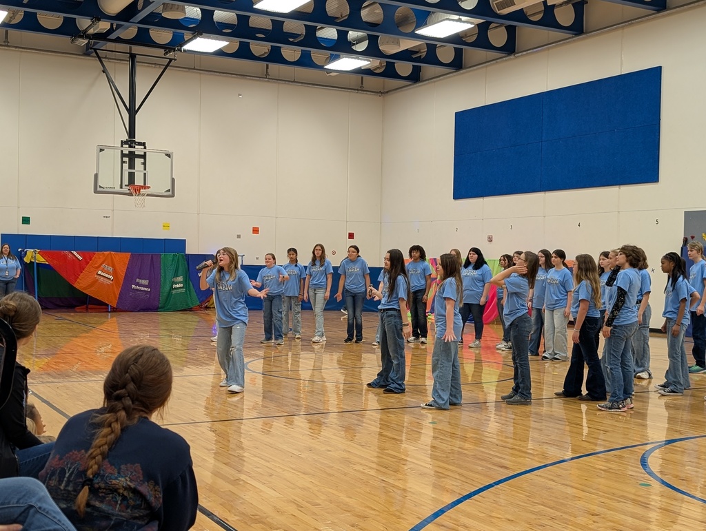 EMS students previewing songs from the musical for Skelly students