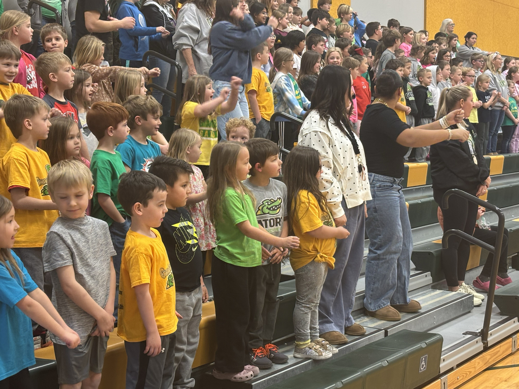 Grandview staff and students cheering on the EHS cheerleaders and band