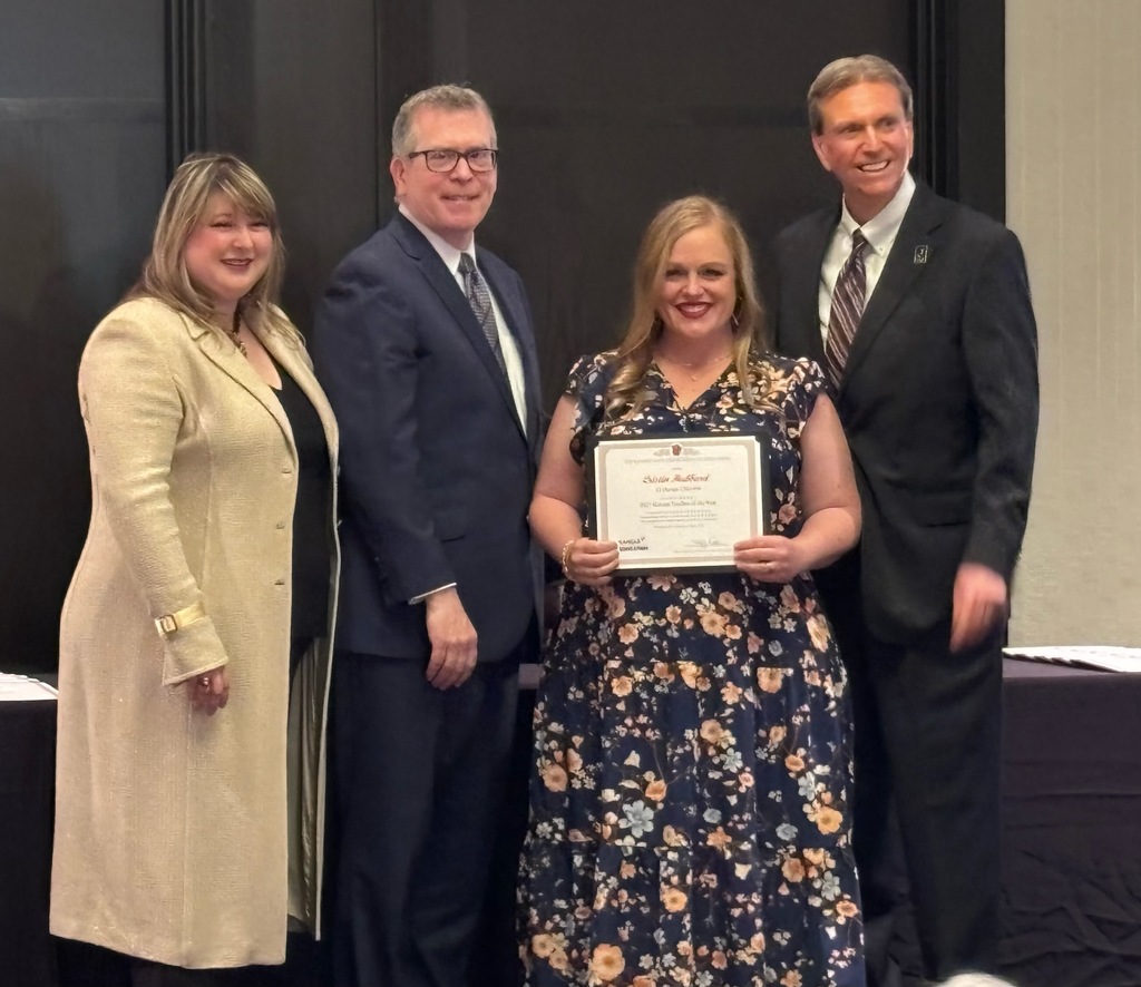 Cristin Hubbard receiving her certificate