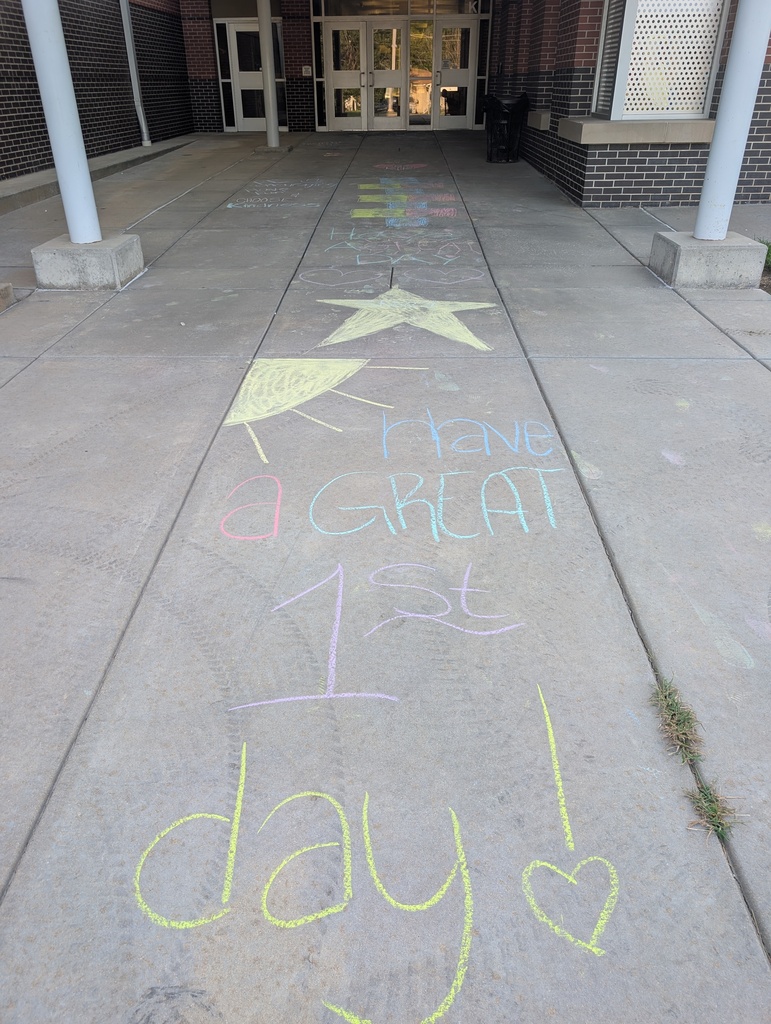 "Have a great first day" in sidewalk chalk