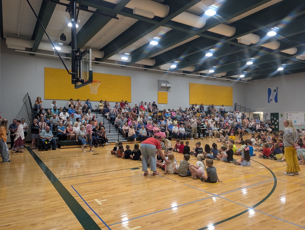 Grandparents and students in the gym at Grandview