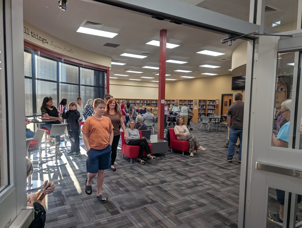 Grandparents waiting for their grandkids in the EMS library