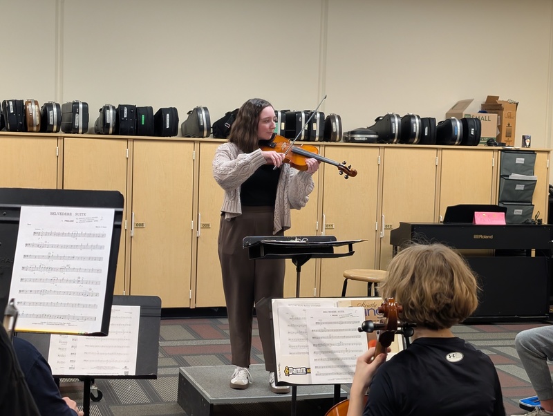 Student Teacher Katelyn Valdez demonstrating a set of notes for EMS students