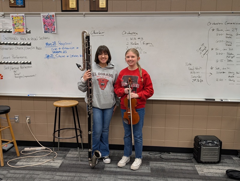Justus Browne and Addison Penner pose with their instruments