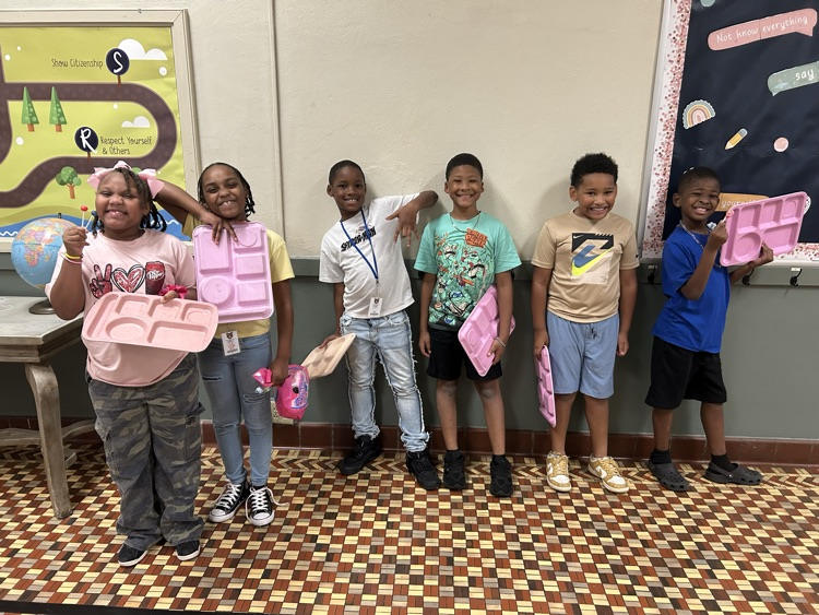 students standing together with their lunch tray