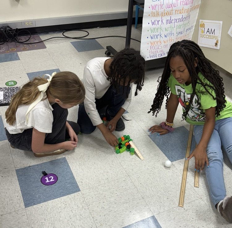 students testing a scientific experiment