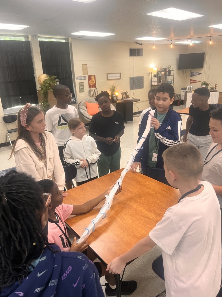 Students building roller coasters