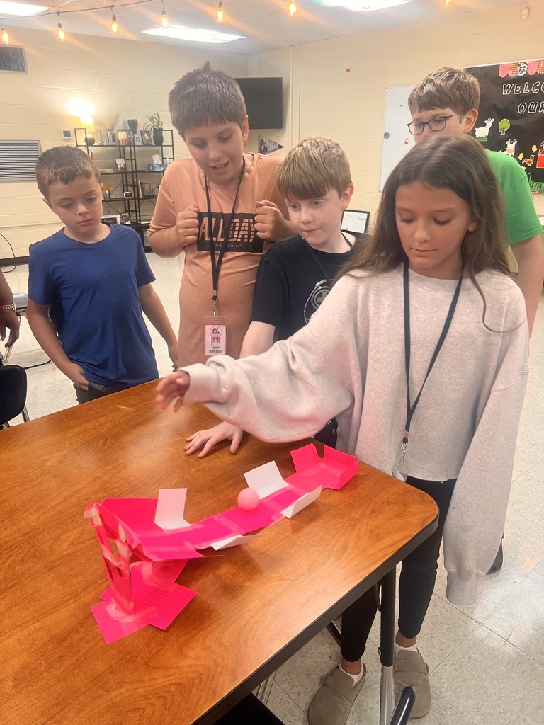 Students building roller coasters