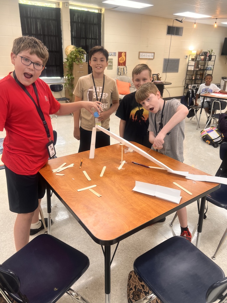 Students building roller coasters