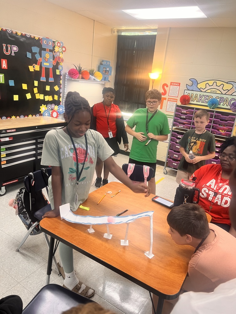 Students building roller coasters