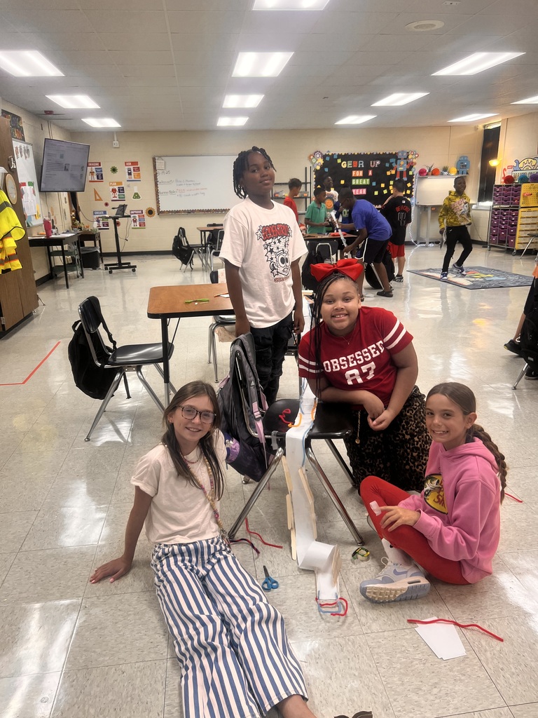 Students building roller coasters
