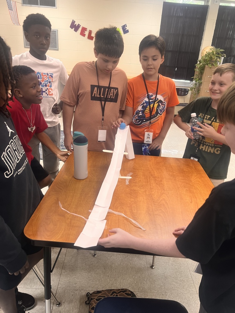 Students building roller coasters