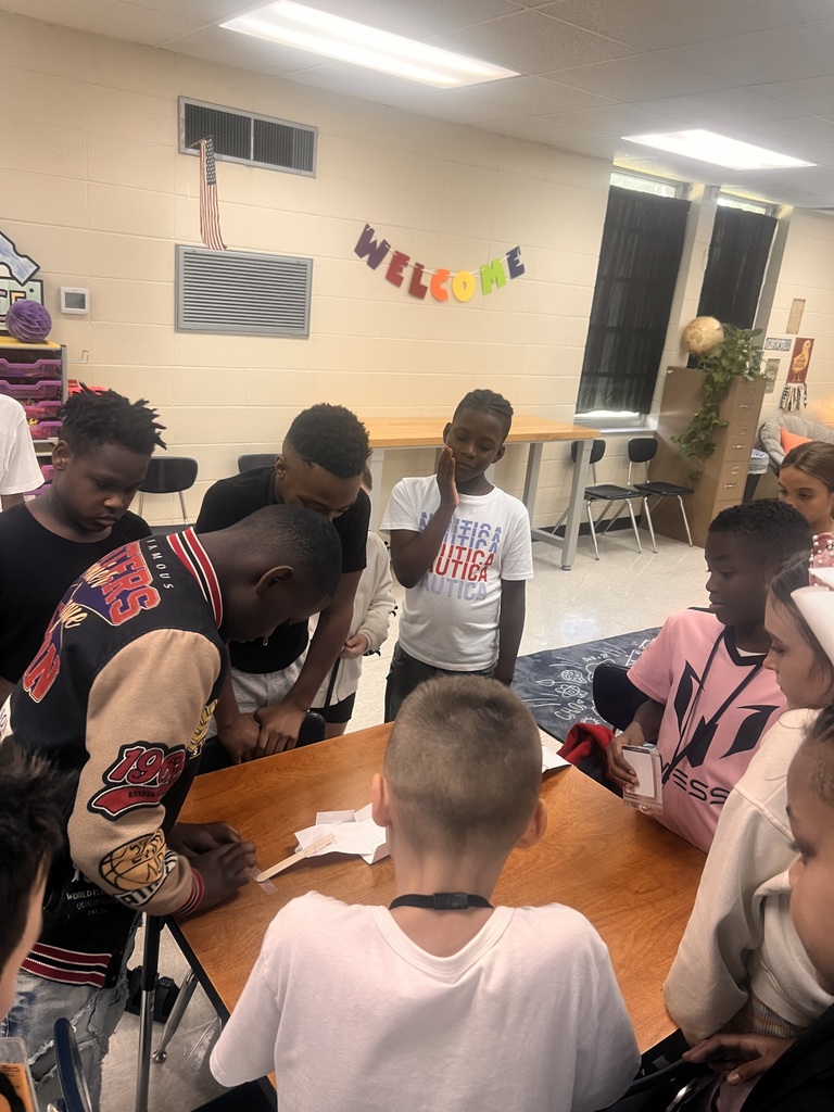 Students building roller coasters