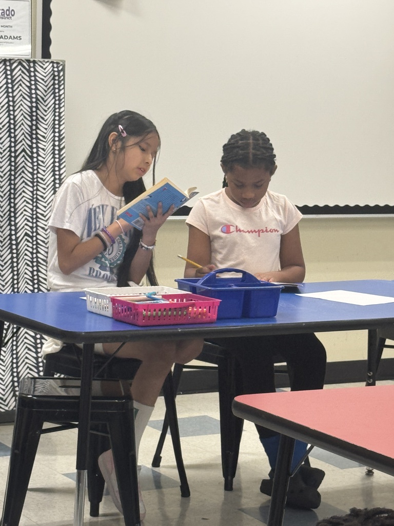 girls reading a book