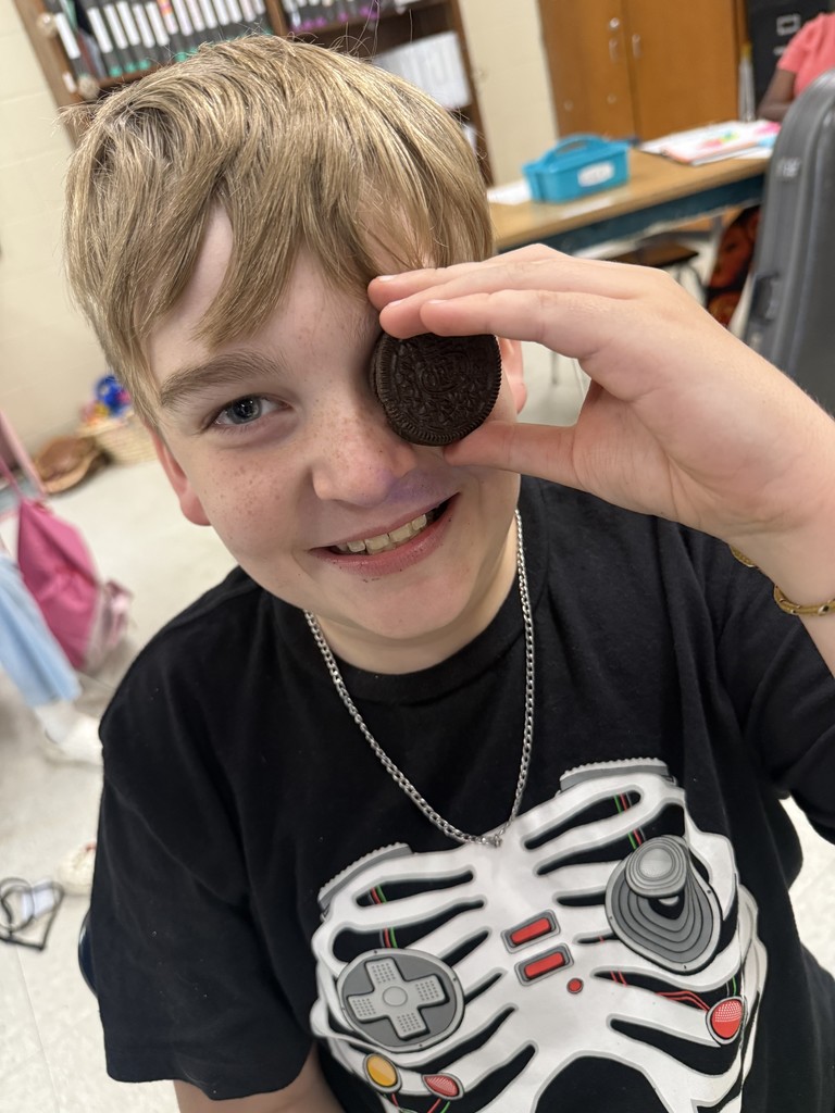 Student with an oreo on his eye