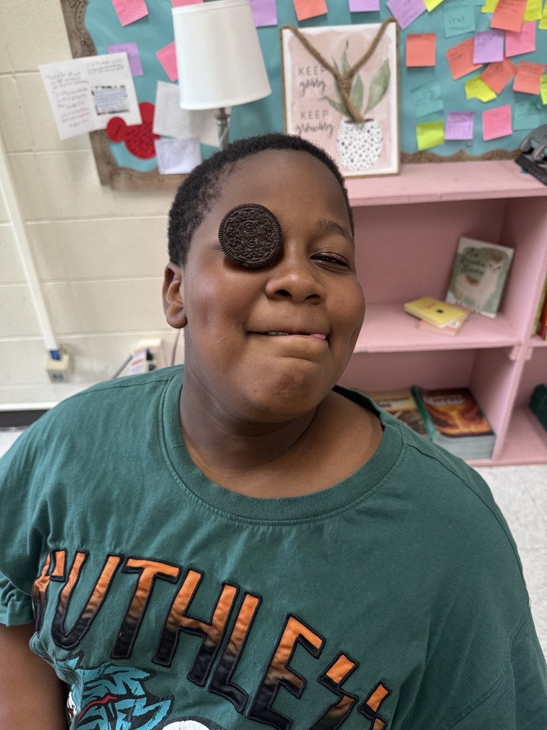 Student with an oreo on his eye