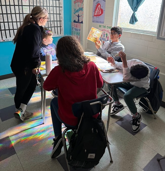 Group collaborating in social studies